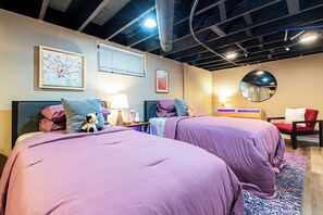 A hotel room with two beds, a mirror, a desk, and a chair. - Parkway Palace: 5BR Pet friendly home near downtown Sleeps 10 Game Room included (Louisville)
