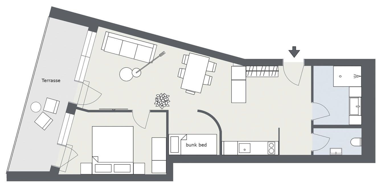 Grundriss mit Terrasse, Etagenbett und einer Küchenzeile.
