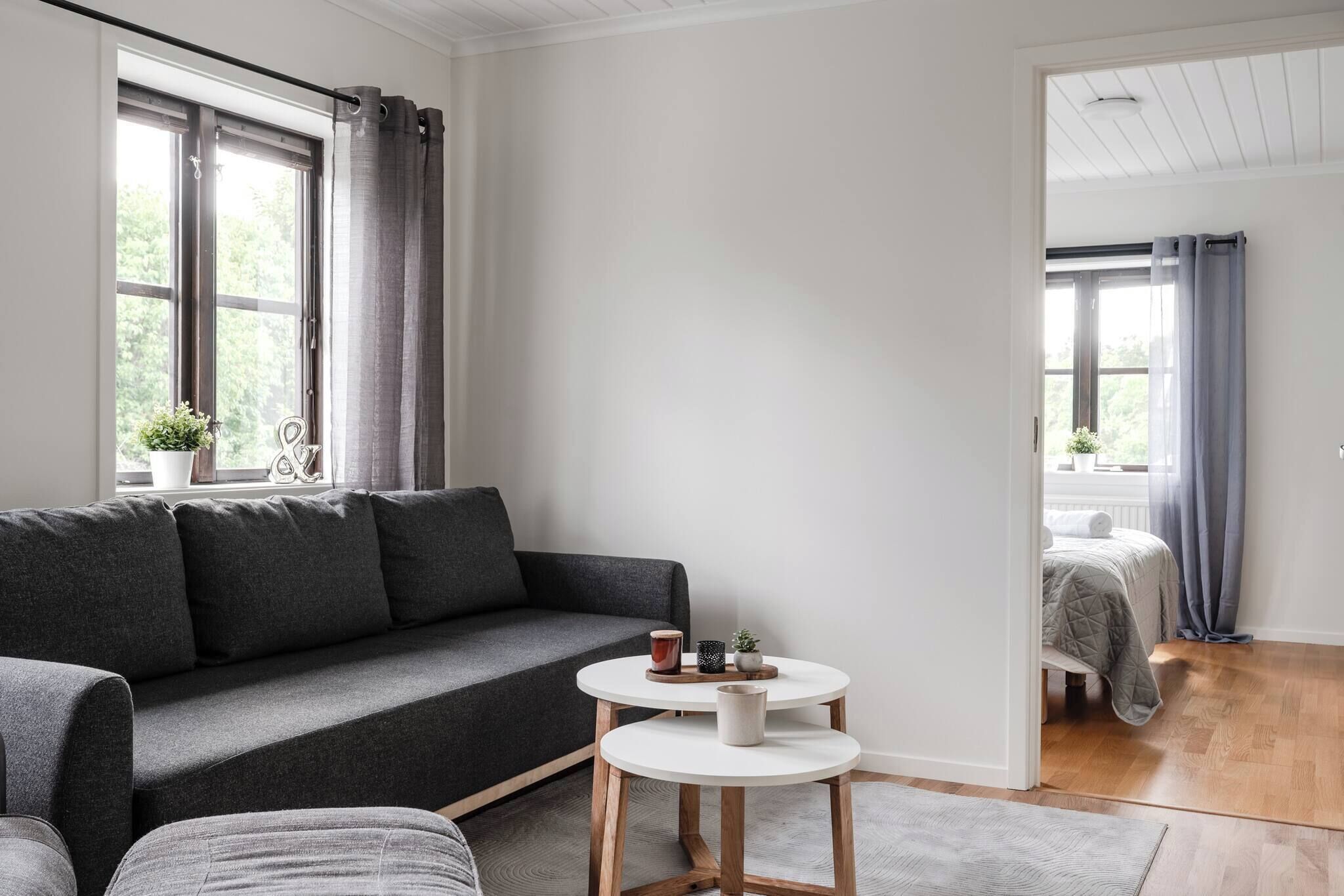 Apartment, 2 Bedrooms, Accessible, Balcony | Living room | Books