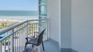 A balcony with a view of the beach and ocean. - Amazing Oceanfront View Unit with Pool Access (Myrtle Beach)