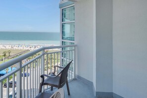 A balcony with a view of the beach and ocean. - Amazing Oceanfront View Unit with Pool Access (Myrtle Beach)