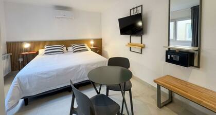 Hotel-style room with a private bathroom