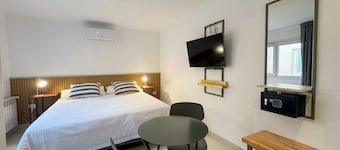 Hotel-style room with a private bathroom