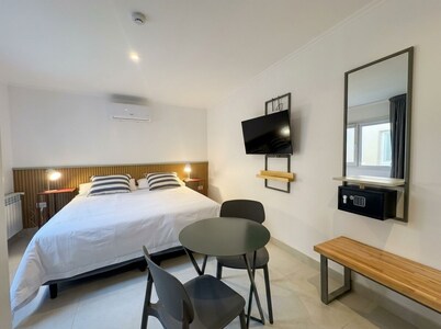 Hotel-style room with a private bathroom