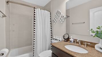 Hair dryer, towels, soap, toilet paper