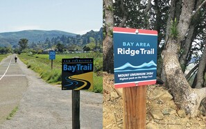 Eine Straße mit Schildern für den Bay Area Ridge Trail und den San Francisco Bay Trail.