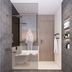 Un bagno moderno con doccia a vetro, una vasca freestanding e una porta in legno.