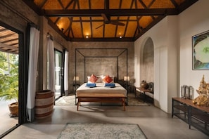 A bedroom with a large bed, a wooden ceiling, a large window, and a view of greenery outside. - Shanti Rock Residence Koh Phangan  (Koh Phangan)
