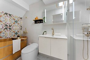 A modern bathroom with a shower, toilet, and sink. - Charming Character Terrace, Eclectic Vintage Charm (Petersham)