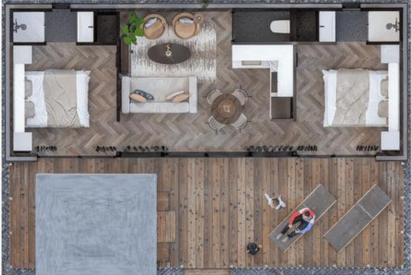A hotel room layout with a bed, seating area, and a small balcony.