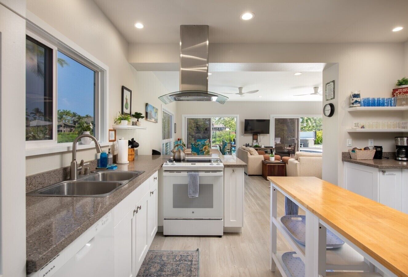Main-house kitchen connected to the living and dining space