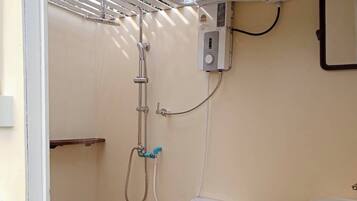 Tent, River View | Bathroom | Separate bathtub and shower, free toiletries, slippers, towels