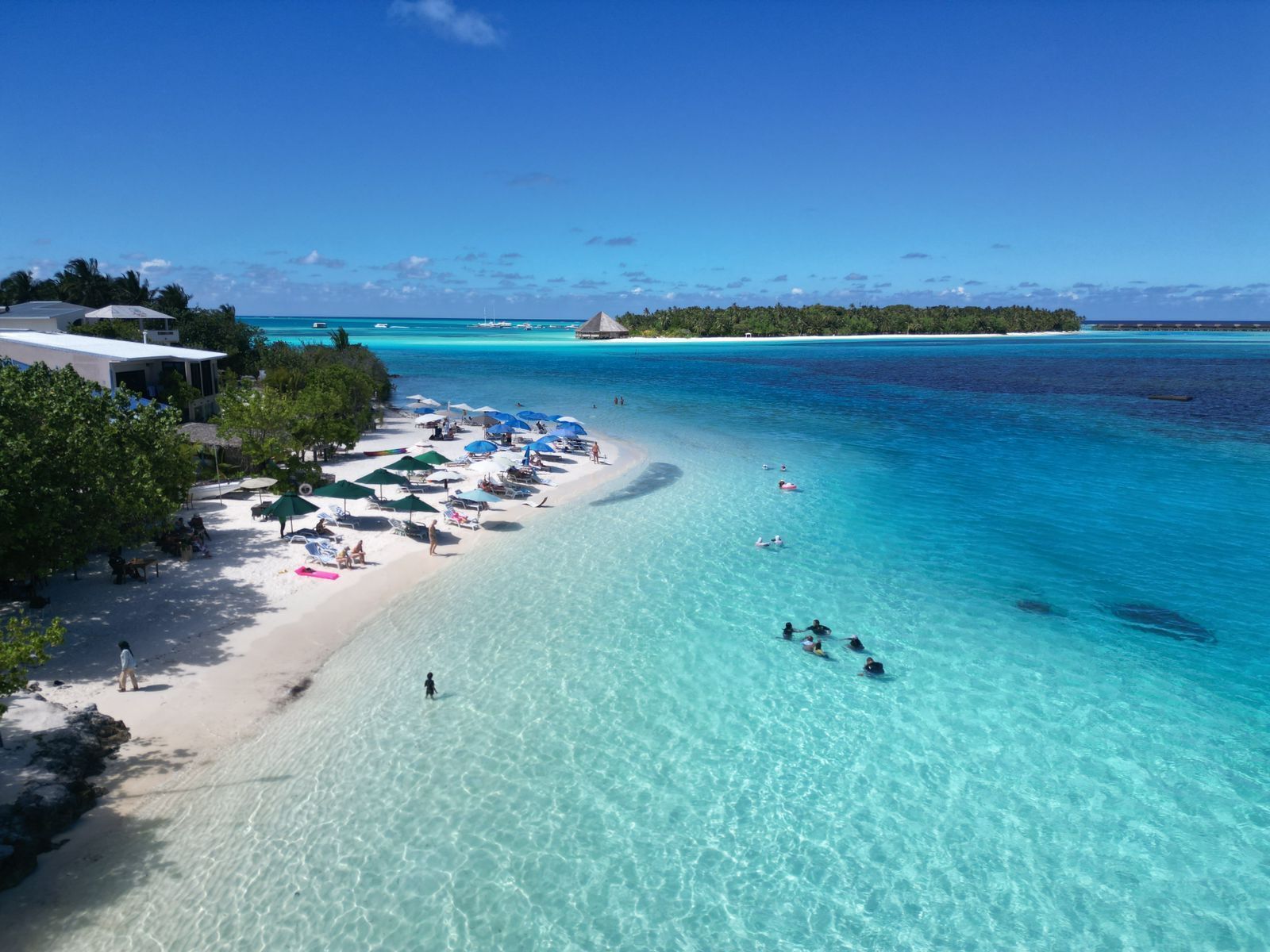 On the beach, sun loungers, beach towels