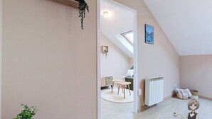 A modern interior with a loft-style room, a dining area, and a staircase. - The Tarbaise Canopy • Patio, tranquility & coziness (Tarbes)