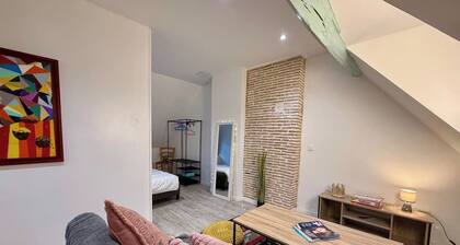 Attic apartment above an English-style café — downtown Boussac