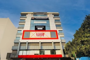 A multi-story hotel with a prominent sign for RCC Hotels Banjara Hills. - RCC Hotels Banjara Hills (Hyderabad)