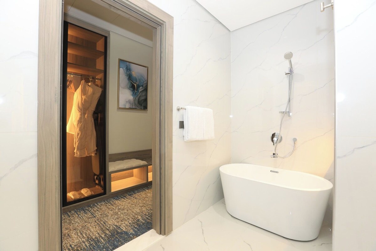 Hair dryer, slippers, towels, soap