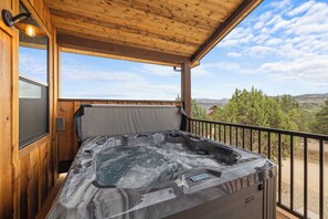 A hot tub on a wooden deck with a view of a mountainous landscape. - The Perch – Brand New Zion Retreat with Hot Tub (Orderville)