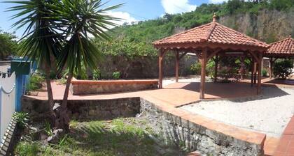 Bungalow 'Détente Tropicale Soleil Mer' with Sea View, Wi-Fi and Air Conditioning