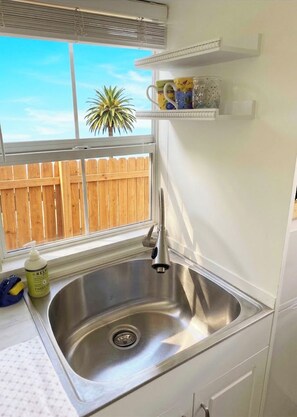 Large Kitchen sink. Lage enough to washing clothes.