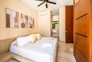Enjoy restful nights in a cozy King suite featuring elegant décor, air conditioning, and plenty of natural light. - Luxury 4BR Villa in Tulum | Jaguar Park & Beach (Tulum)
