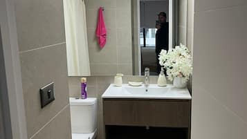 Hair dryer, towels, soap, toilet paper