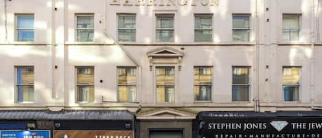 A multi-story building with the name 'HARRINGTON' prominently displayed.
