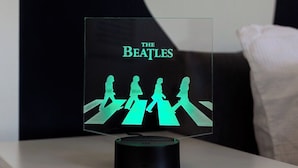 A framed Beatles album cover on a bedside table. - Flatzy - Iconic Beatles and Liverpool Culture Home (Liverpool)