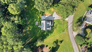 An aerial view of a house surrounded by a well-maintained lawn and dense trees. - Walk to Boat Ramp Lake Keowee w/ Parking + Firepit (Seneca)