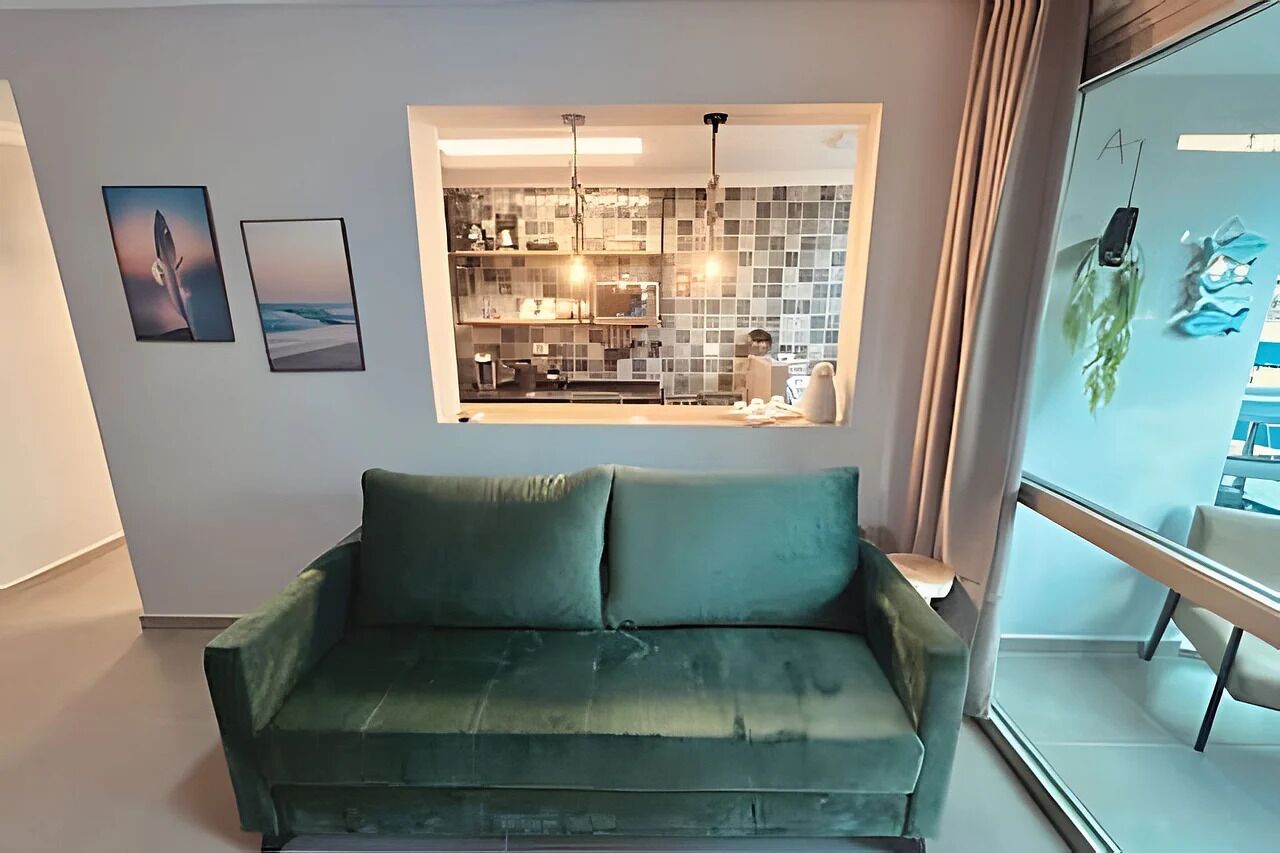 Deluxe Apartment, Balcony, Beach View | Living area