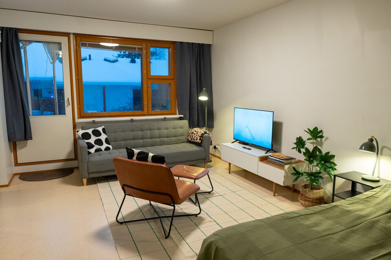 The downstairs living room and direct access to backyard