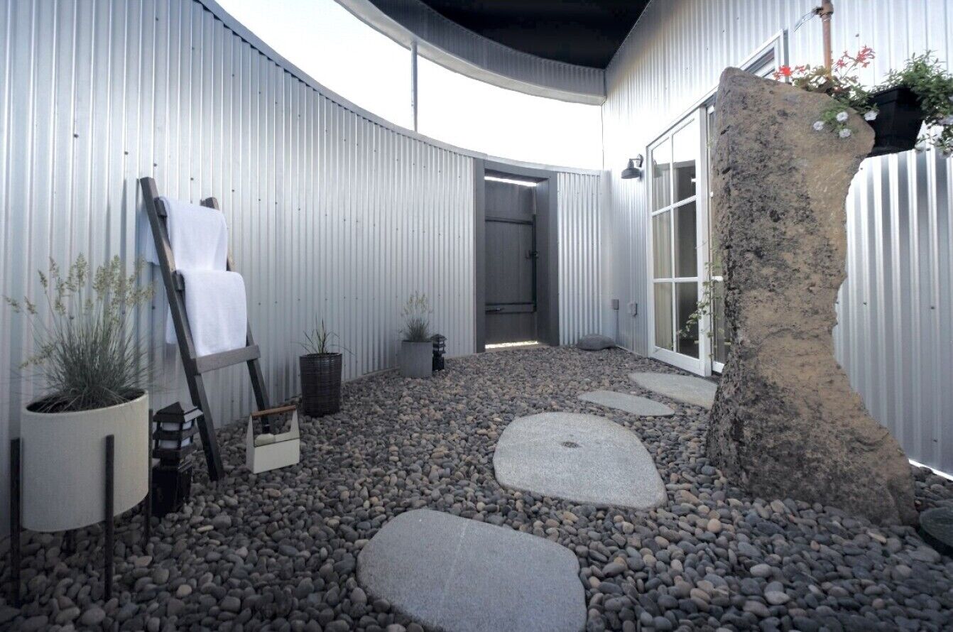 The Granary’s private Zen garden — a larger outdoor retreat with a seasonal hot-water shower, available May through October.