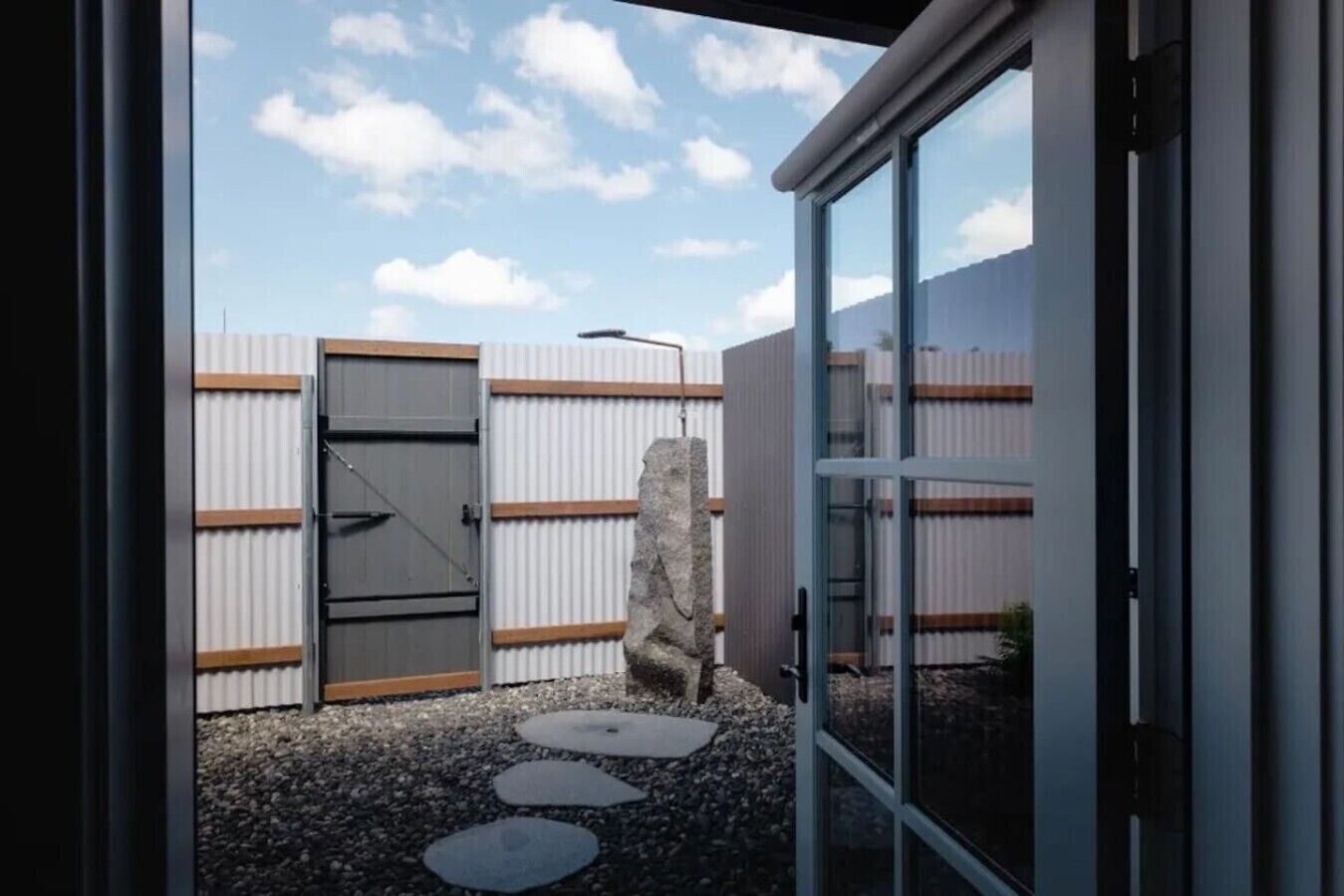 Step outside to your own private outdoor shower—one of our favorite features of each Barn suite.