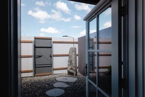 Step outside to your own private outdoor shower—one of our favorite features of each Barn suite.
