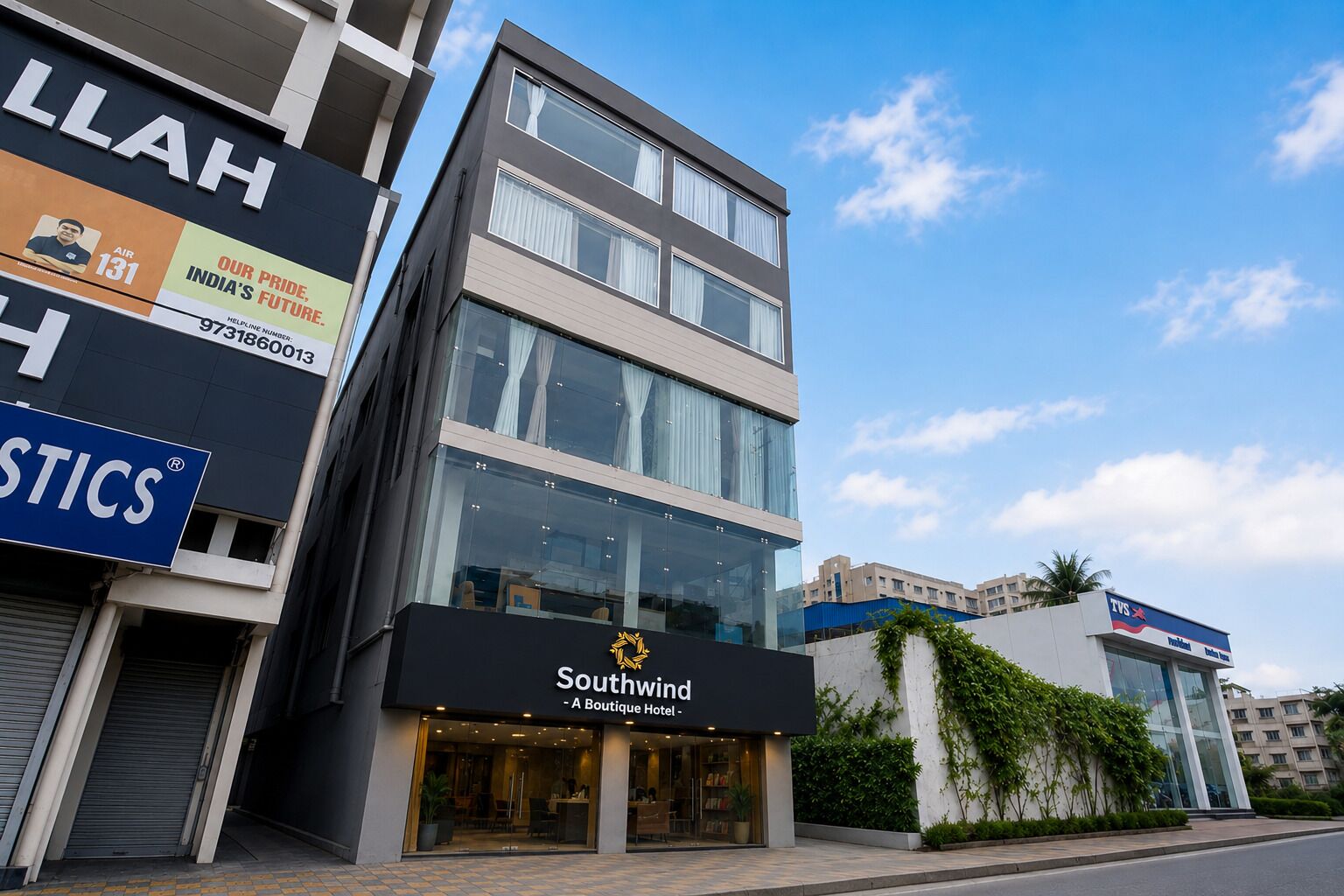 A modern building with a boutique hotel named Southwind on the ground floor.