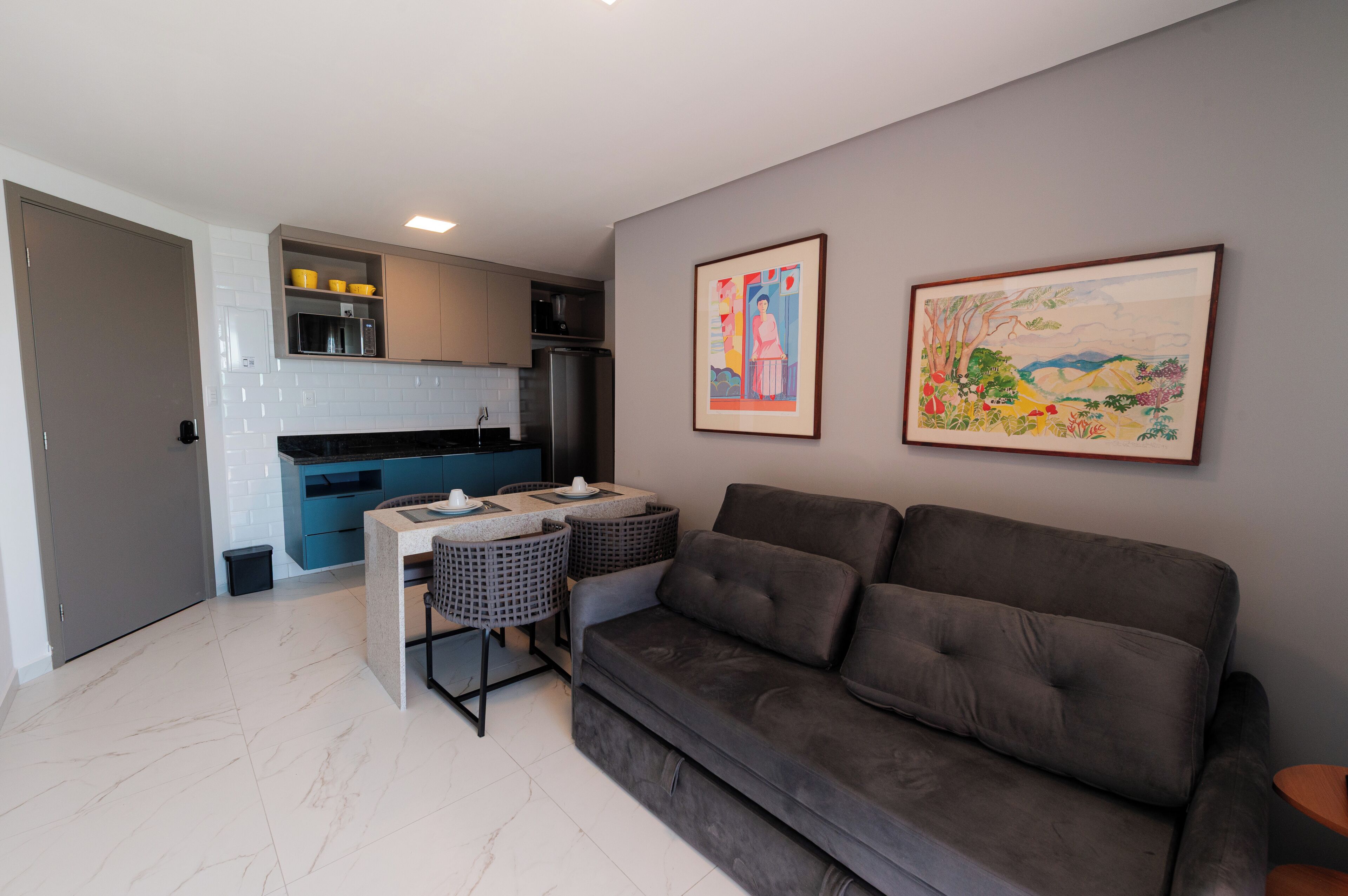 Deluxe Apartment, Sea View | Living area | 32-inch Smart TV with satellite channels