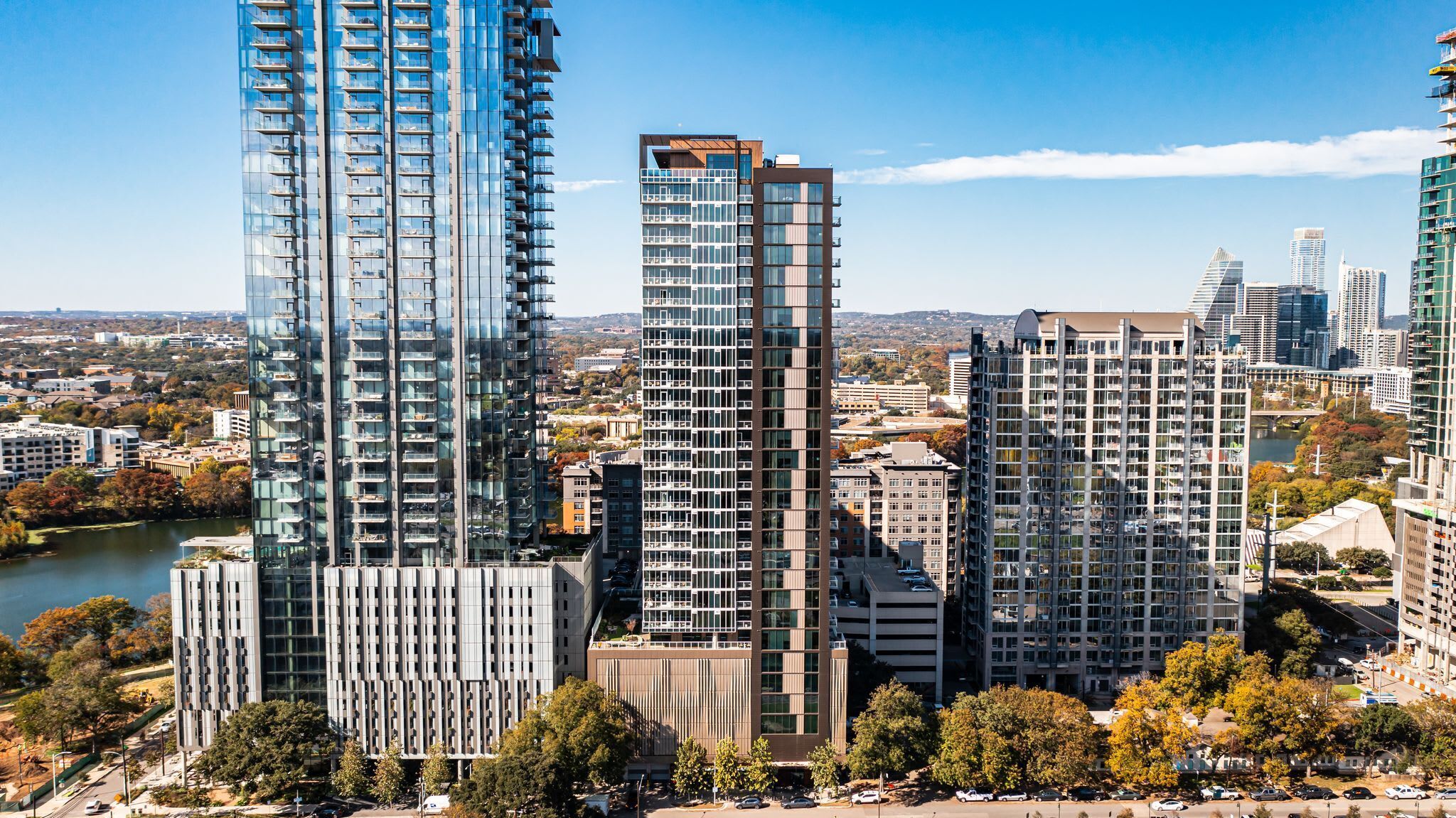 A high-rise building with multiple floors and a modern architectural design.