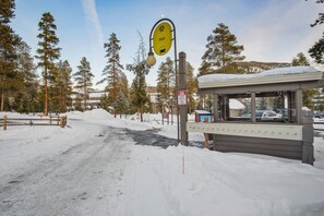 A snow-covered road with a sign indicating a parking area. - 5 minutes from Keystone Resort with Hot Tub & Pool (Keystone)