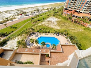 A resort with a swimming pool, beach access, and a view of the ocean. - Portofino- Gulf Front with Beautiful Sunsets! (Escambia County)