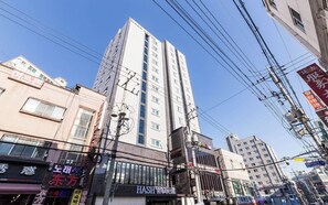 A multi-story building with a prominent sign for 'HASH HOTEL' on the ground floor. - Suwon Hash Hotel (Suwon)