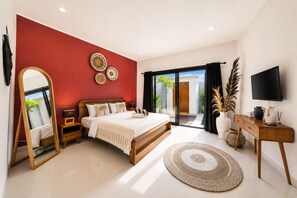 A modern bedroom with a large bed, a TV, and a desk. - Brand NEW Paradise Villa, Huge Pool Canggu Rooftop (Kuta Utara)