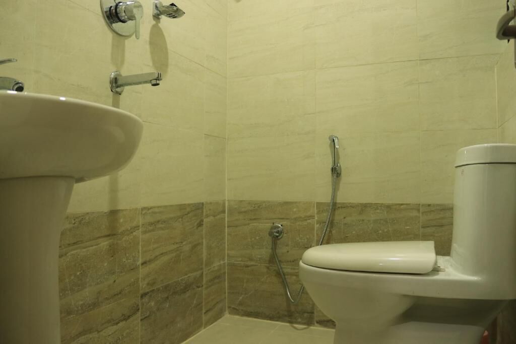 Shower, free toiletries, slippers, towels