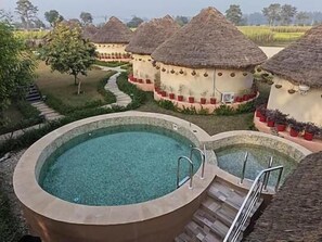 Unclassified image, 5 of 9, button - forest mud villas (Haridwar)