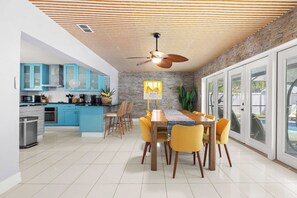 Dining Area: Bright and inviting dining space with comfortable seating, offering the perfect setting for breakfast, family dinners, or casual meals throughout your vacation.