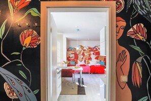 A room with a bed, a desk, and a chair. There is a window with blinds. - A Midsummer Night's Dream at Karoline's House (Binz)
