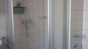 Chuveiro, secador de cabelo