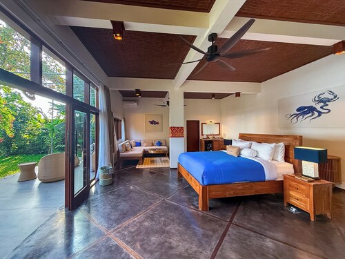 Luxury Beachfront King Suite with Terrace, Pool, and Breakfast