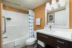 A bathroom with a shower, toilet, and vanity with a mirror. - Your Home Base Near Philly + Free Parking. Kitchen (Mount Laurel)