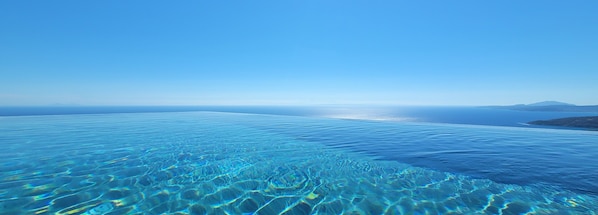 A clear view of a large body of water with a distant shoreline and mountains. - The Luminous Villa: private estate, 4 sea-view suites, heated pool, sleeps 8 (Volimes)