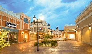 A shopping mall with stores like Polo Ralph Lauren and Coach. - Close to Jeptha Creed Distillery + Free Breakfast (Shelbyville)